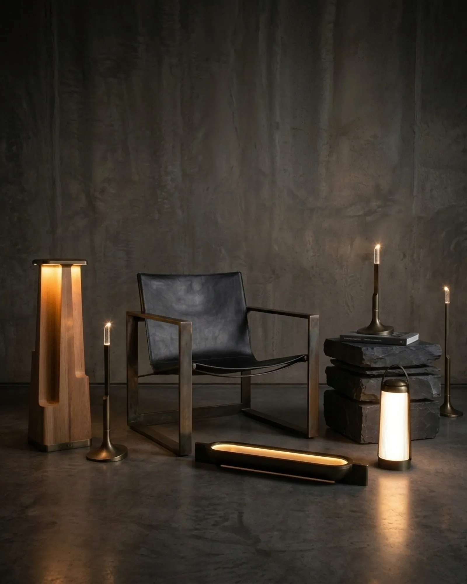 Passages lamps around a leather chair, lit, in a dark room