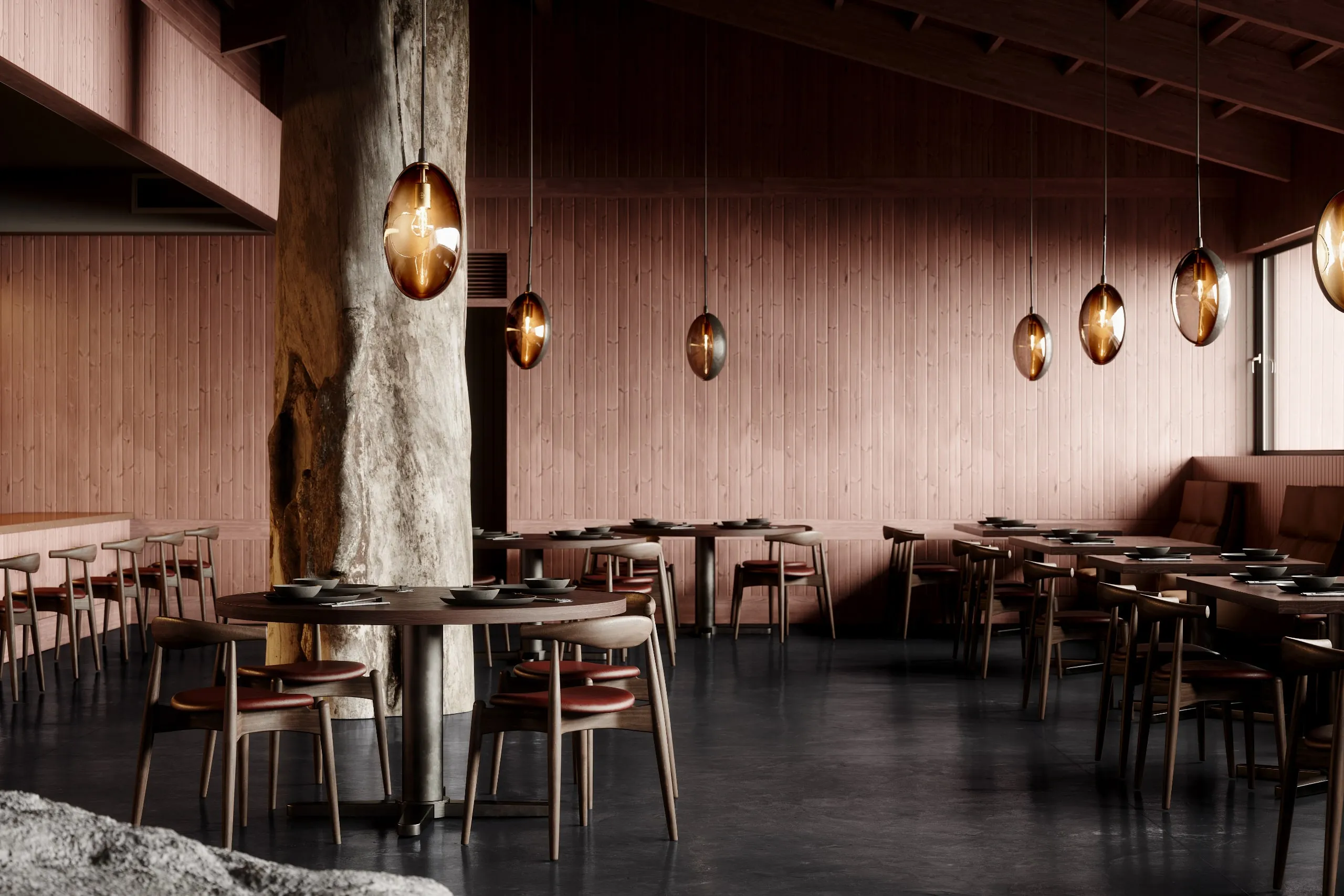 Oona pendants hung in a line through a timber-walled restaurant
