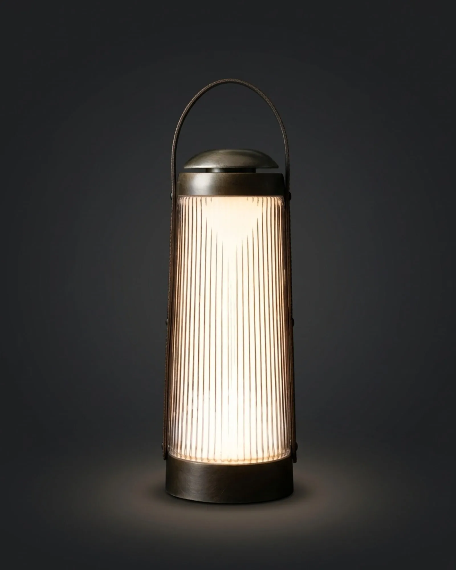 A Passage Lantern with its fluted glass, against a dark wall