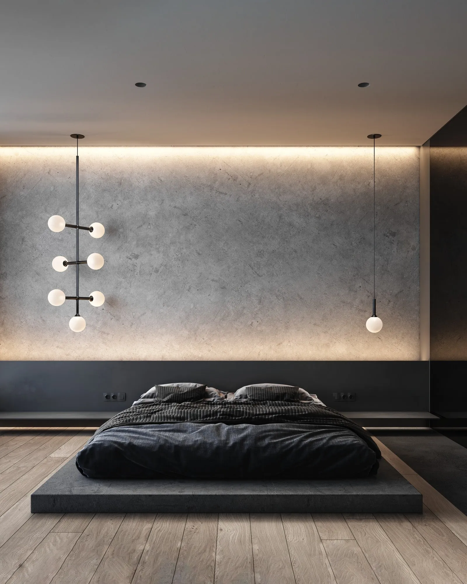 JUNIP pendants and a sconce in a dark bedroom with a low platform bed
