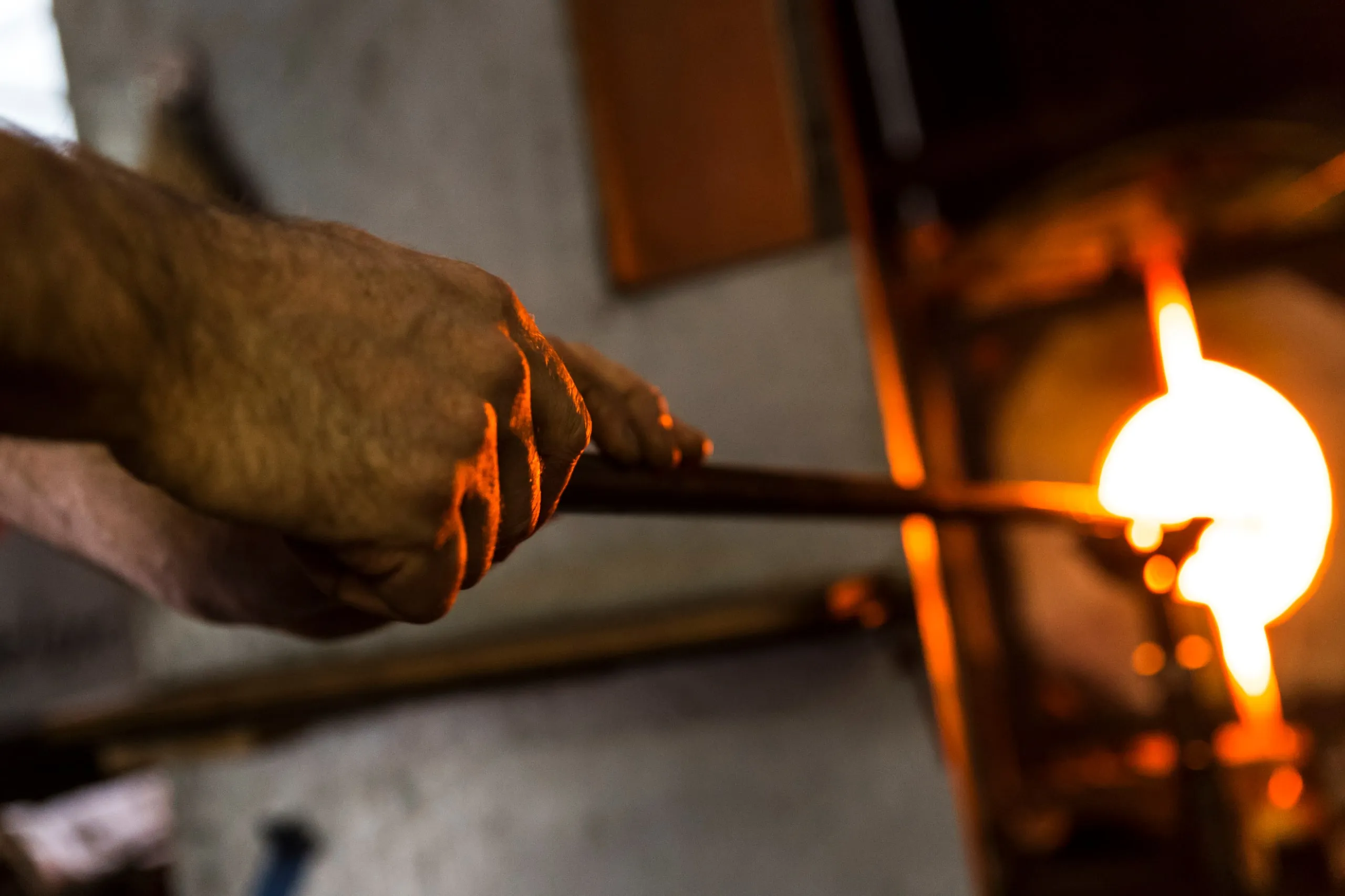 Molten glass gathered on the blowpipe for an Oona